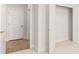 Bright walk-in closet, with shelving and light-colored carpet at 1619 Tielman Way, Snellville, GA 30078