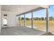 Relaxing covered patio with decorative pillars and stunning backyard views at 1619 Tielman Way, Snellville, GA 30078