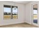 Cozy dining area with a stylish pendant light and large window overlooking the backyard at 1619 Tielman Way, Snellville, GA 30078