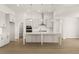 Contemporary kitchen featuring a large center island, stainless steel appliances, and plenty of cabinet space at 1619 Tielman Way, Snellville, GA 30078