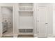 Mudroom features a built in shelving, bench, and storage at 1619 Tielman Way, Snellville, GA 30078