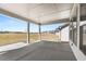 Covered patio featuring sturdy columns overlooking the backyard of the property at 1619 Tielman Way, Snellville, GA 30078