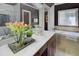 Elegant bathroom with a soaking tub, white countertops, and dark wood cabinets for a relaxing retreat at 195 Mystic Ct, Atlanta, GA 30342