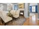 Elegant dining room with chandelier and fireplace, perfect for entertaining guests at 195 Mystic Ct, Atlanta, GA 30342