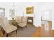 Bright dining room with chandelier and a fireplace, offering a blend of sophistication and warmth at 195 Mystic Ct, Atlanta, GA 30342