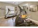 Well-equipped home gym featuring a treadmill, elliptical machine, weights, and a mirrored wall, perfect for fitness enthusiasts at 195 Mystic Ct, Atlanta, GA 30342