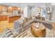 Inviting living room boasts hardwood floors, stainless steel appliances, and open access to kitchen area at 195 Mystic Ct, Atlanta, GA 30342