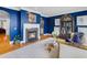 Sophisticated living room with a fireplace, hardwood floors, and elegant decor at 195 Mystic Ct, Atlanta, GA 30342