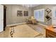 Study featuring natural light, decorative chandelier, and wood flooring at 195 Mystic Ct, Atlanta, GA 30342