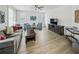 Cozy living room features a comfortable sofa, natural lighting, and modern décor at 2059 Wheaton Way, Atlanta, GA 30328
