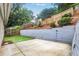 Landscaped backyard featuring a concrete patio at 2983 Crosswycke Forest Dr, Brookhaven, GA 30319