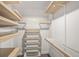 Walk-in closet with custom shelving at 2983 Crosswycke Forest Dr, Brookhaven, GA 30319