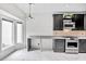Eat-in kitchen features stainless appliances, stone countertops, and bright light from windows at 2983 Crosswycke Forest Dr, Brookhaven, GA 30319