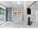 Open living area features a fireplace, built-in bookshelves, and sliding glass doors to the outside at 2983 Crosswycke Forest Dr, Brookhaven, GA 30319