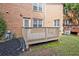 Backyard featuring a wooden deck and lots of trees at 87 Davis Mill Ct, Lawrenceville, GA 30044