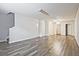 Finished basement with hardwood floors, stairwell, and multiple doorways at 87 Davis Mill Ct, Lawrenceville, GA 30044