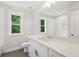 Bathroom features a white vanity and two windows at 1158 Welch Sw St, Atlanta, GA 30310
