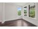 Cozy bedroom featuring hardwood floors, large windows, and natural light at 1158 Welch Sw St, Atlanta, GA 30310