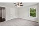 Bright bedroom with plush carpeting and one window at 1158 Welch Sw St, Atlanta, GA 30310