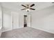 Bright bedroom features a ceiling fan and neutral carpet at 1158 Welch Sw St, Atlanta, GA 30310
