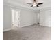 Spacious bedroom with ceiling fan and plush carpeting at 1158 Welch Sw St, Atlanta, GA 30310