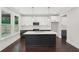 Bright kitchen boasts a center island, modern cabinetry, and stainless steel appliances at 1158 Welch Sw St, Atlanta, GA 30310