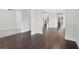 Open-concept living area with hardwood floors, neutral paint, and natural light at 1158 Welch Sw St, Atlanta, GA 30310