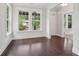 Bright living room featuring hardwood floors, large windows, and natural light at 1158 Welch Sw St, Atlanta, GA 30310