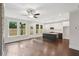 Open living space with hardwood floors, kitchen island, and lots of natural light at 1158 Welch Sw St, Atlanta, GA 30310