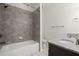 Bathroom features a tub-shower combo, granite vanity, and modern fixtures at 310 Rose Garden Ln, Alpharetta, GA 30009