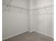 Empty walk-in closet with wire shelving and carpet at 310 Rose Garden Ln, Alpharetta, GA 30009