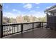 This private deck area offers a relaxing outdoor space with views of the surrounding neighborhood at 310 Rose Garden Ln, Alpharetta, GA 30009