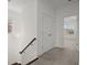 Bright hallway with a closet and a view into a well-lit bedroom at 310 Rose Garden Ln, Alpharetta, GA 30009
