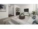 A stylish living room offers comfortable seating, modern decor, and an entertainment area with a large sectional at 310 Rose Garden Ln, Alpharetta, GA 30009