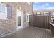 Cozy outdoor patio area with wood fence, perfect for relaxing or entertaining guests at 310 Rose Garden Ln, Alpharetta, GA 30009