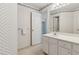 A half bathroom with a vintage wallpaper design at 3175 Lake Seminole Pl, Buford, GA 30519