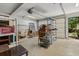 Spacious garage featuring overhead lighting, ample storage shelving, and an automatic door opener at 3175 Lake Seminole Pl, Buford, GA 30519