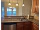 Beautiful kitchen with granite countertops, stainless steel appliances, and a view to the outdoors at 407 Aerif Pl, Woodstock, GA 30188