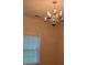 Chandelier lit living room with window providing natural light at 407 Aerif Pl, Woodstock, GA 30188