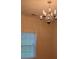 This bedroom features a chandelier and natural light from the window with blinds at 407 Aerif Place Pl, Woodstock, GA 30188