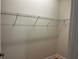 This walk-in closet features wire shelving on the walls for easy storage at 407 Aerif Place Pl, Woodstock, GA 30188