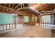 Large unfinished basement showcasing open framing and lots of space for storage at 1801 Summerview Ct, Woodstock, GA 30189