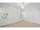 Bedroom with natural light, a decorative chandelier, and minimalist design at 1801 Summerview Ct, Woodstock, GA 30189
