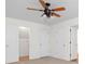 Bedroom with a ceiling fan and multiple closets, offering ample storage space at 1801 Summerview Ct, Woodstock, GA 30189