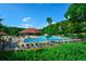 Resort-style pool area, complete with a large pool, chairs and ample seating under a gazebo at 1801 Summerview Ct, Woodstock, GA 30189