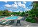 Inviting community pool area with ample seating, providing a perfect spot for relaxation at 1801 Summerview Ct, Woodstock, GA 30189