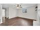 View of a basement area with wood-look flooring, fireplace, and a bright window at 3414 Dearwood Sw Dr, Lilburn, GA 30047