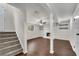 Finished basement featuring a fireplace, wood floors, and a cozy seating area at 3414 Dearwood Sw Dr, Lilburn, GA 30047