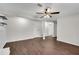 Basement rec room featuring wood floors, recessed lighting, and a neutral color scheme at 3414 Dearwood Sw Dr, Lilburn, GA 30047