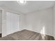 Bedroom with plush carpeting, neutral paint, and closet storage at 3414 Dearwood Sw Dr, Lilburn, GA 30047